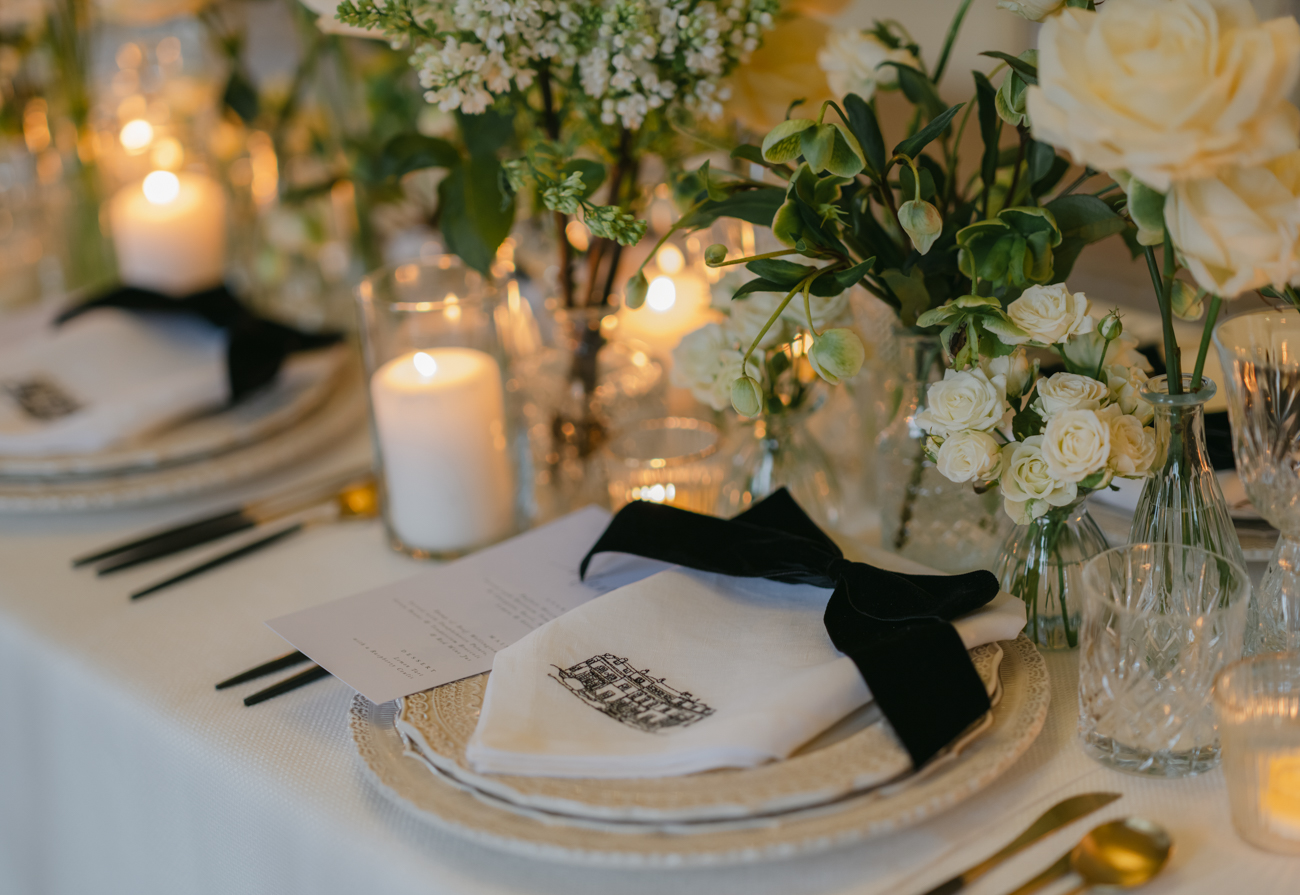 table setting black bow embroidered napkin