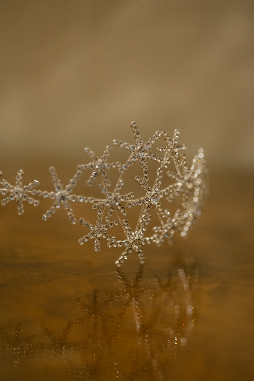 diamond headpiece with reflection on glass