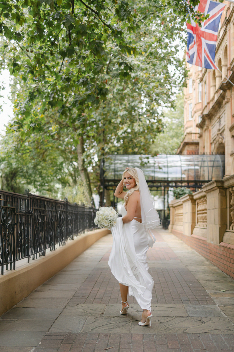 SDLandmark867 guests toasting at Lanesborough wedding